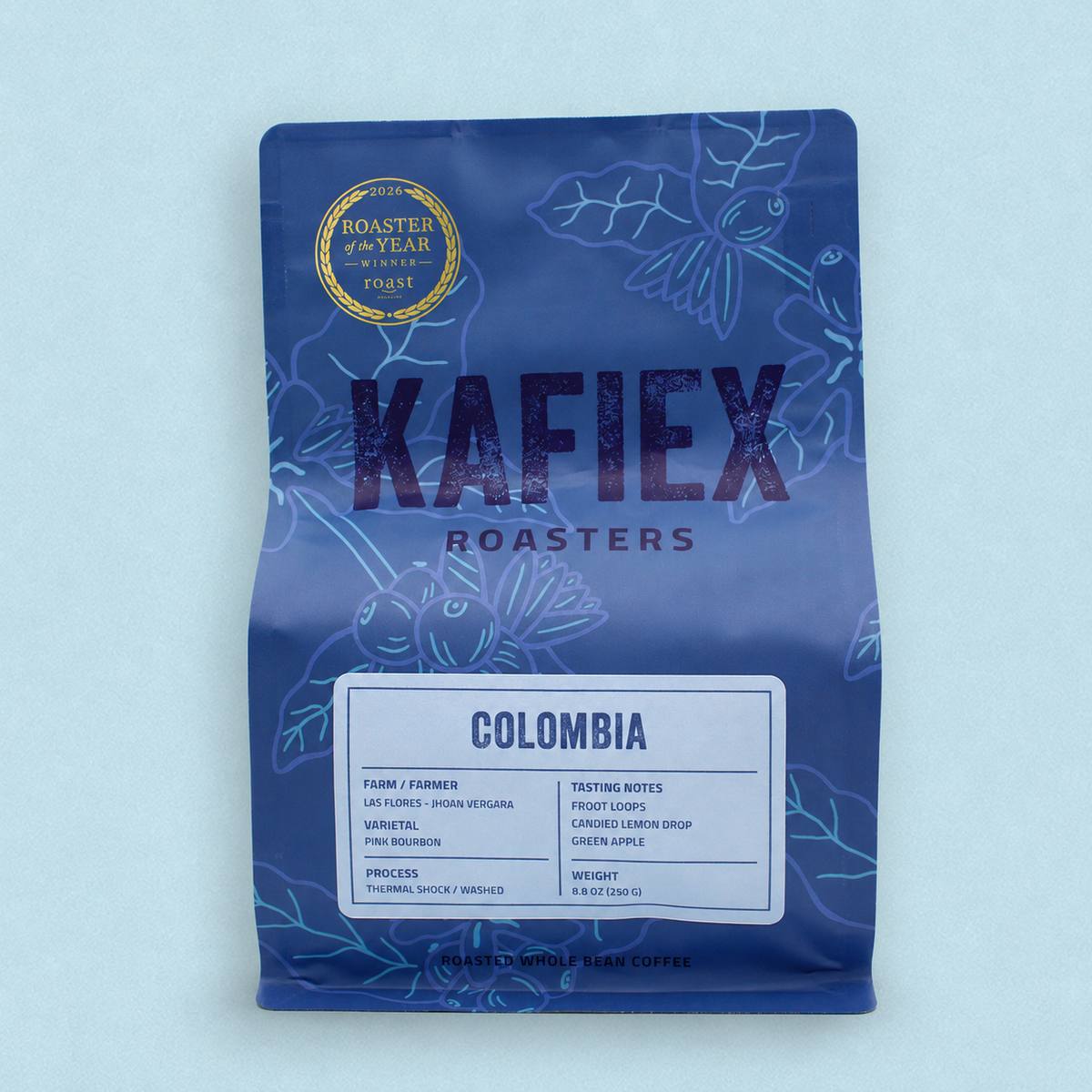 Kafiex Roasters Jhoan Vergara Las Flores Pink Bourbon Washed Thermal Shock Reserve coffee, 8.8 oz (250 g), with Froot Loops, Candied Lemon Drop and Green Apple tasting notes on a pale blue background.