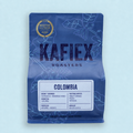 Kafiex Roasters Nativo Nogales Reserve 8.8 oz (250 g) blue retail bag with Caturra Natural + Mosto label and sweet orange, peach and tropical tasting notes. Temporary product mockup.