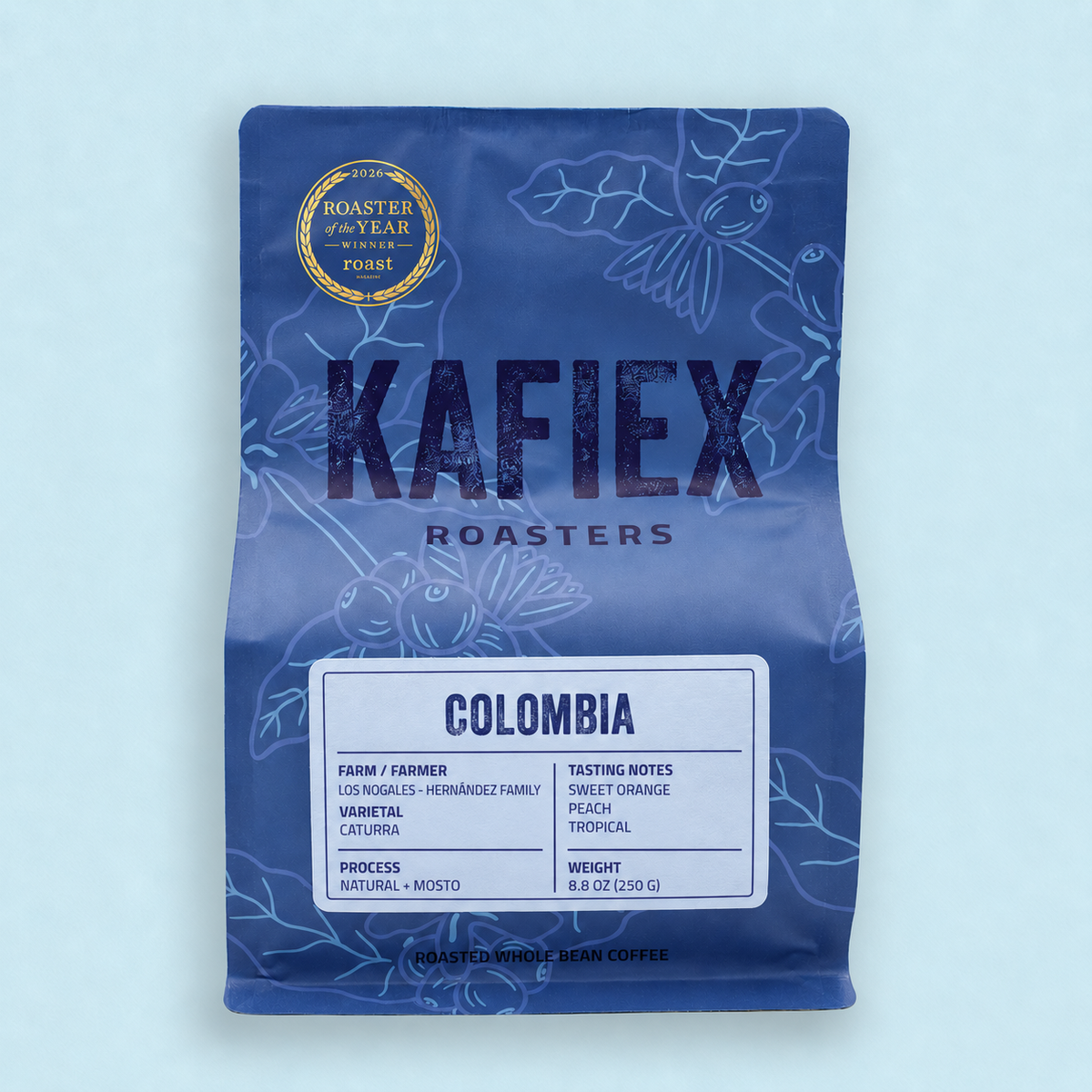 Kafiex Roasters Nativo Nogales Reserve 8.8 oz (250 g) blue retail bag with Caturra Natural + Mosto label and sweet orange, peach and tropical tasting notes. Temporary product mockup.
